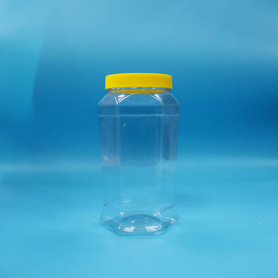 Des biscuits de qualité alimentaire bonbons en forme hexagonale PET transparent bocal à vis jaune