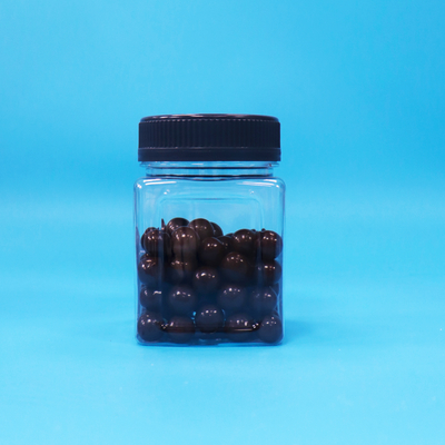 Des biscuits de bonbons sans BPA étanches à l'air, transparents, carrés, à poignée en PET, en plastique, contenant des noix